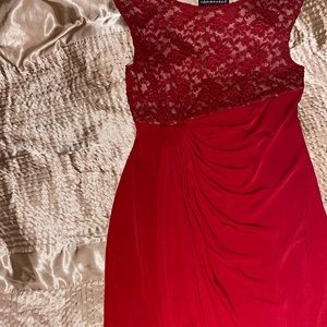 A beautiful red and Bergeny color dress with flower that look like a big rose M